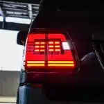 LED Tail Light Assembly Pair with Sequential Turn Signals for 1998-2007 Lexus LX470 & Toyota Land Cruiser LC100, Red Housing