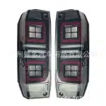 LED Rear Tail Light Assembly Compatible with Toyota Land Cruiser LC71 LC78 FJ71 FJ78, Smoked Brake Lamp Pair